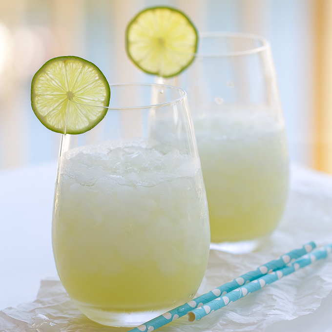 summer seasonal drinks with rum and cucumber and lemon